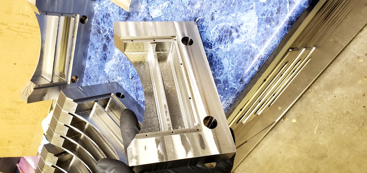 Complex machined aluminum bracket assemblies