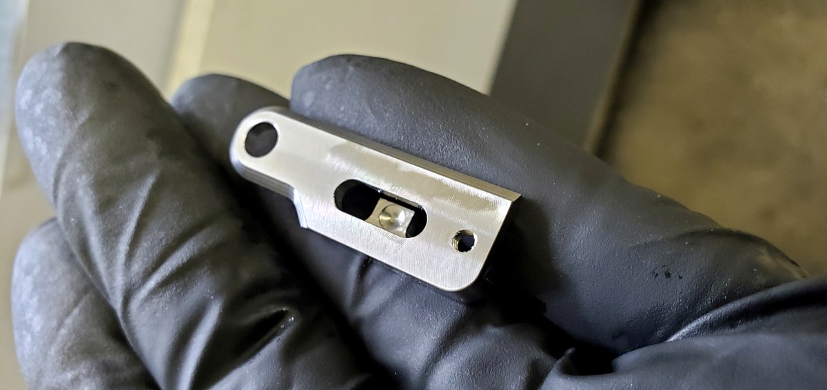 Precision machined part reverse side